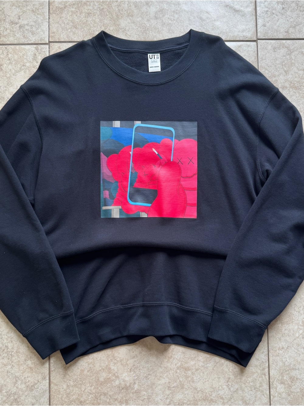 Uniqlo x KAWS Black Sweatshirt with Pink Graphic